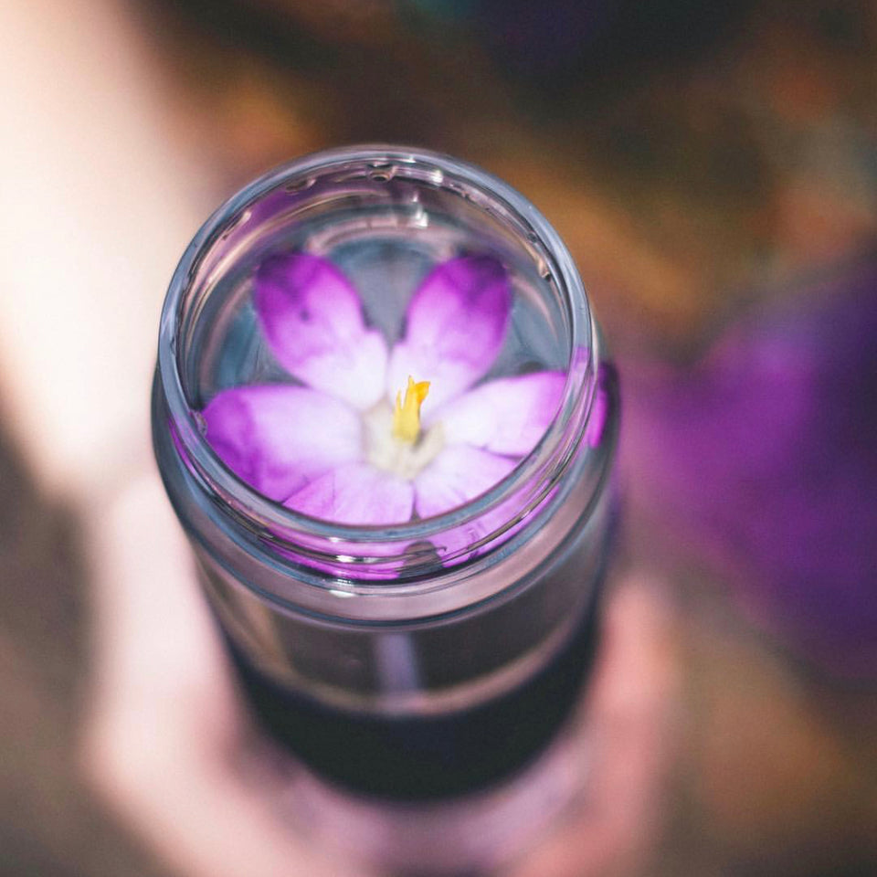 Glass water bottle flower